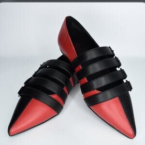 Strange Cvlt Coven flats in split black/red harlequin